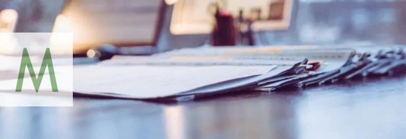 Documents on a desk, terms and conditions